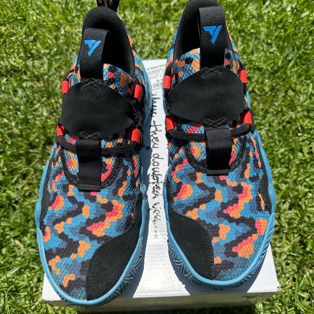 Adidas Trae Young Blue and Orange Sneakers Modern Sporty Design